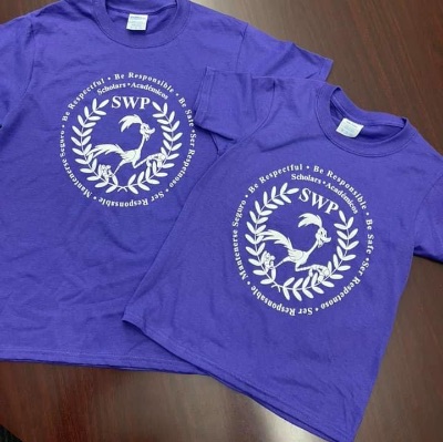 Children’s SMALL purple t-shirt item