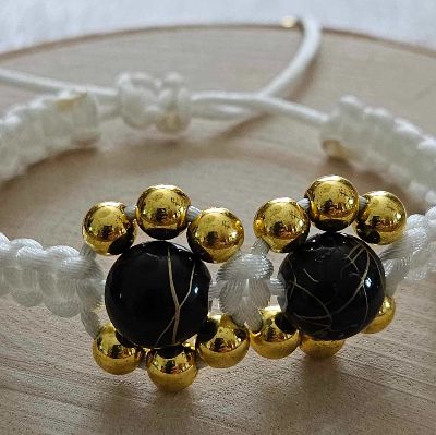 Bracelet tissé et billes - 7 pouces item