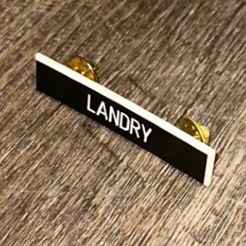 Épinglette de nom item