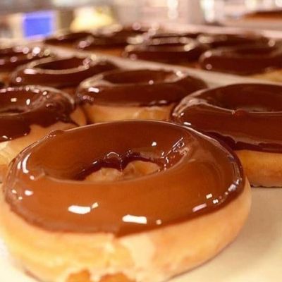 One Dozen Chocolate Iced Donuts item