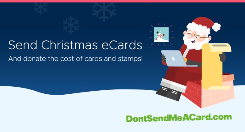 eCards for charity, father Christmas in a sleigh sending a card on a laptop